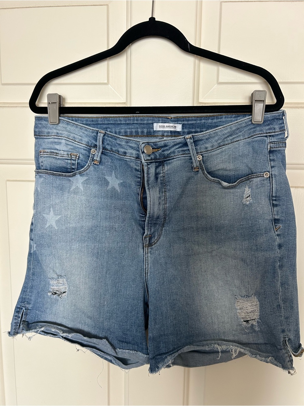 Good American Destructed faded Star Print cut off denim jean shorts